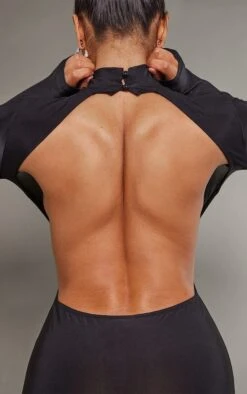 Robe Longue Moulante Noire à Col Montant Et Dos Ouvert -Zeze Vetements Magasin 24b85b52ce2913f08559a900725dcb527a06e7a2 cnb7474 4