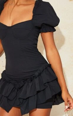 Robe Noire Texturée à Manches Bouffantes Et Jupe Volantée -Zeze Vetements Magasin 2b05306c1aca16cfd9737fb479f3a5e81e3d7040 cmt1597 4