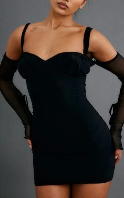 Robe Très Moulante Noire à Buste Froncé Et Manches Découpées En Mesh -Zeze Vetements Magasin 4b11290c322789a9912ddce25564f89410685e0a cnc2981 4
