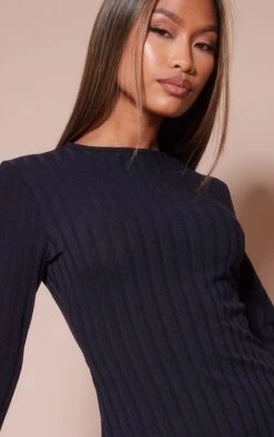 Robe Moulante Noire En Maille Côtelée Large à Manches évasées Légèrement Volantées -Zeze Vetements Magasin 5e496b9c0ce2cfb931164c8dd88206181398a504 cnd5512 4