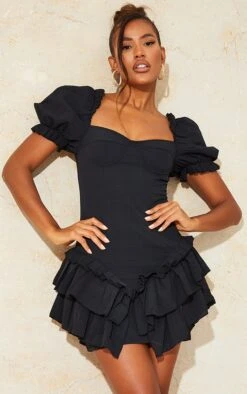 Robe Noire Texturée à Manches Bouffantes Et Jupe Volantée