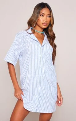 Robe Chemise Texturée Rayée Bleue à Manches Courtes Et Poche 10 Robe Chemise Texturée Rayée Bleue à Manches Courtes Et Poche -Zeze Vetements Magasin 62d6521acd1df0ccccf011ba7f2e75bd40a11bda cne8552 4