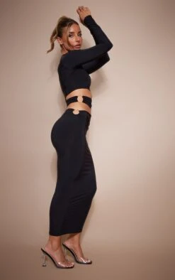 Robe Mi-longue Moulante Noire Découpée à La Taille à Détail Anneaux -Zeze Vetements Magasin 72e48a0126f970f8557cf87dc9fdee20435d14a9 cnd5855 3