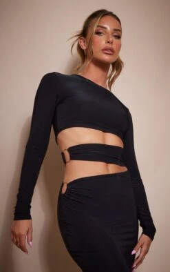 Robe Mi-longue Moulante Noire Découpée à La Taille à Détail Anneaux -Zeze Vetements Magasin 7653b5708ac0d700fccab1acf72756f0c16dbe42 cnd5855 4