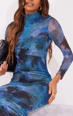 Robe Mi-longue Bleue Fleurie En Mesh à Manches Longues Et Taille Torsadée -Zeze Vetements Magasin 7ece40499dadffc858bc315aa1f5cc31a4ffed05 cna9167 4