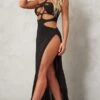 Robe Longue Moulante Noire Fendue à Découpes