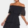 Robe Noire Fluide à Col Bardot Et Volants -Zeze Vetements Magasin c11eac56a163b389272ba96a391390ce4f369eb8 cmf6993 1