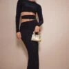 Robe Mi-longue Moulante Noire Découpée à La Taille à Détail Anneaux -Zeze Vetements Magasin d2c543d69bf0e97c2b4c564ddb509b9ceab4f878 cnd5855 1