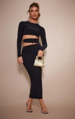 Robe Mi-longue Moulante Noire Découpée à La Taille à Détail Anneaux