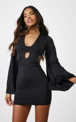 Robe Très Moulante Noire à Découpes Et Manches évasées