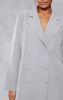 Robe Blazer Oversize Grise à Double Boutonnière Et épaulettes -Zeze Vetements Magasin f807aeeb15173cc666a80b56f49456e90d18a778 cnb0983 4
